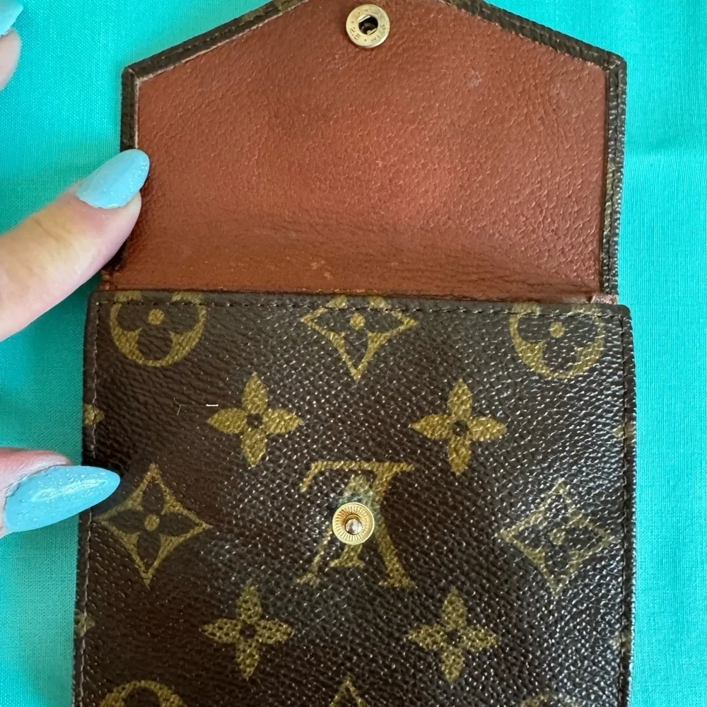 Louis Vuitton Double. Snap Monogram Wallet